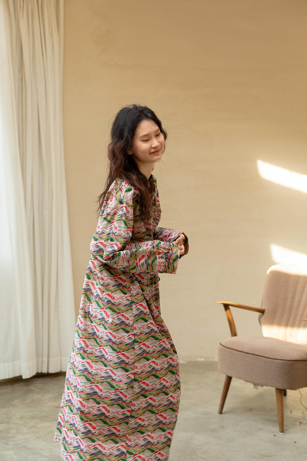 Model wearing an elegant bamboo cotton robe with oriental patterns, featuring a relaxed fit and a green sash, perfect for loungewear and home comfort