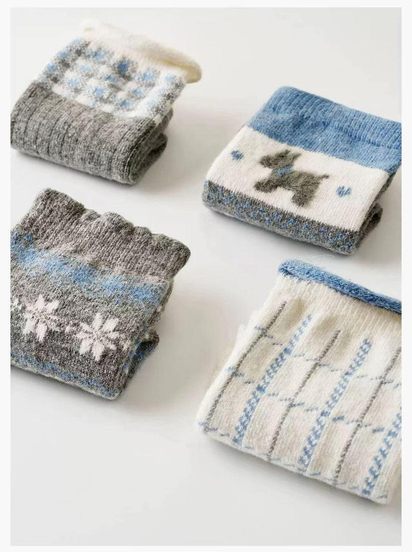 Set of four natural merino wool and cotton blend socks in two color themes, perfect for girls and Christmas stocking fillers.