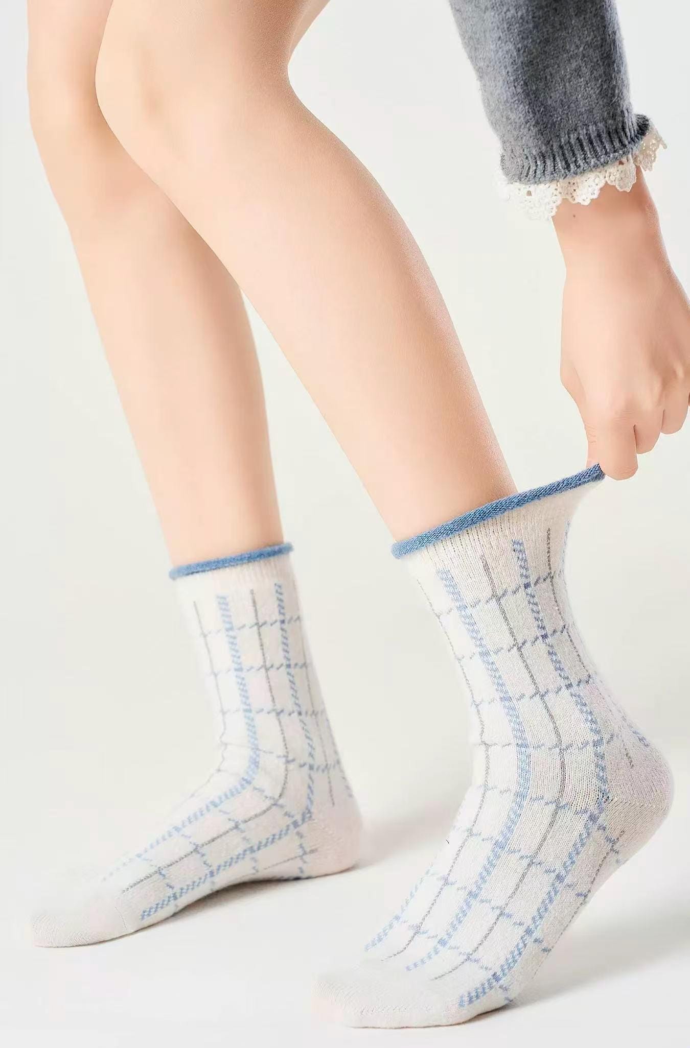 Set of four natural Merino wool and cotton blend socks in two color themes, suitable for girls and Christmas stocking fillers.