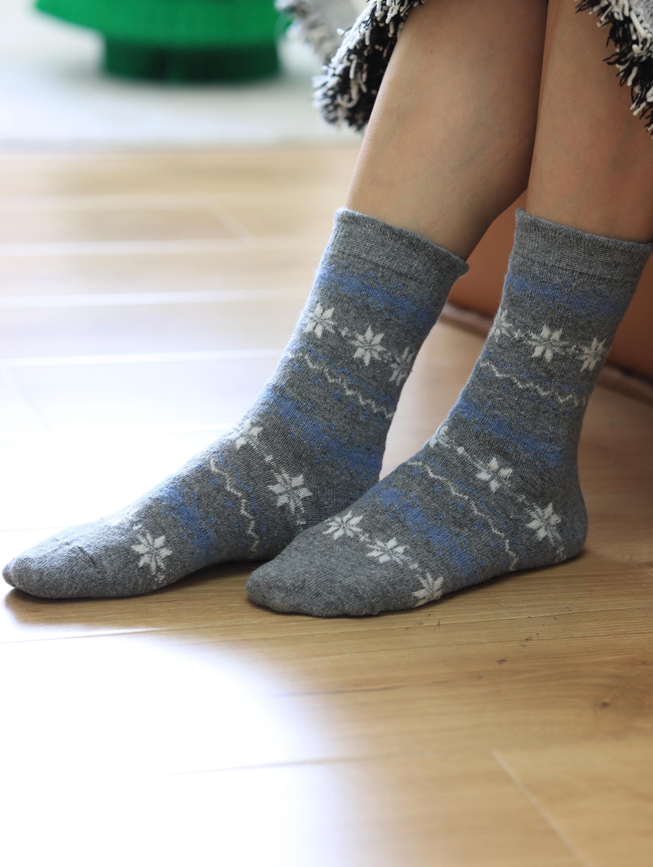 Set of four natural merino wool and cotton blend socks in two color themes, ideal for girls and Christmas stocking fillers.