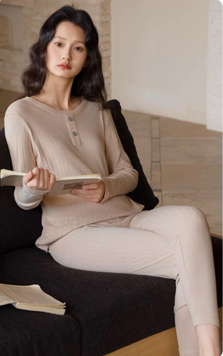 Infant cotton thermal pajama base layer from Lian Loungewear in beige and rose pink, soft ribbed loungewear set for breathable warmth.