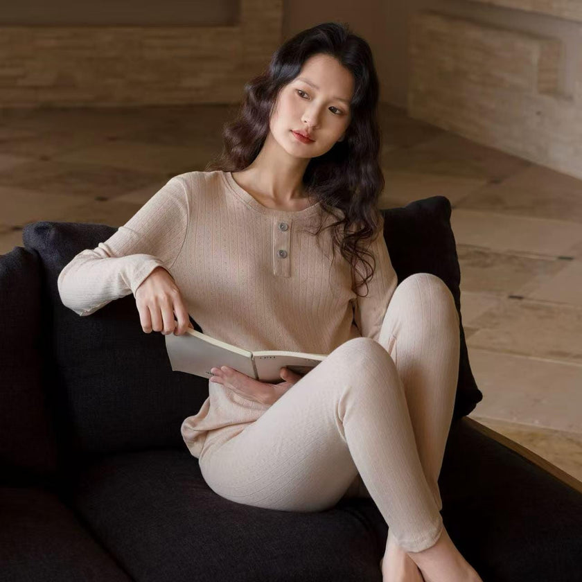 Infant cotton thermal pajama base layer from Lian Loungewear in rose pink and almond beige, soft ribbed loungewear set for warmth and breathability.