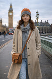 Dark brown and oatmeal two-tone cashmere beanie by Lian Loungewear, featuring a cozy knit winter hat design.