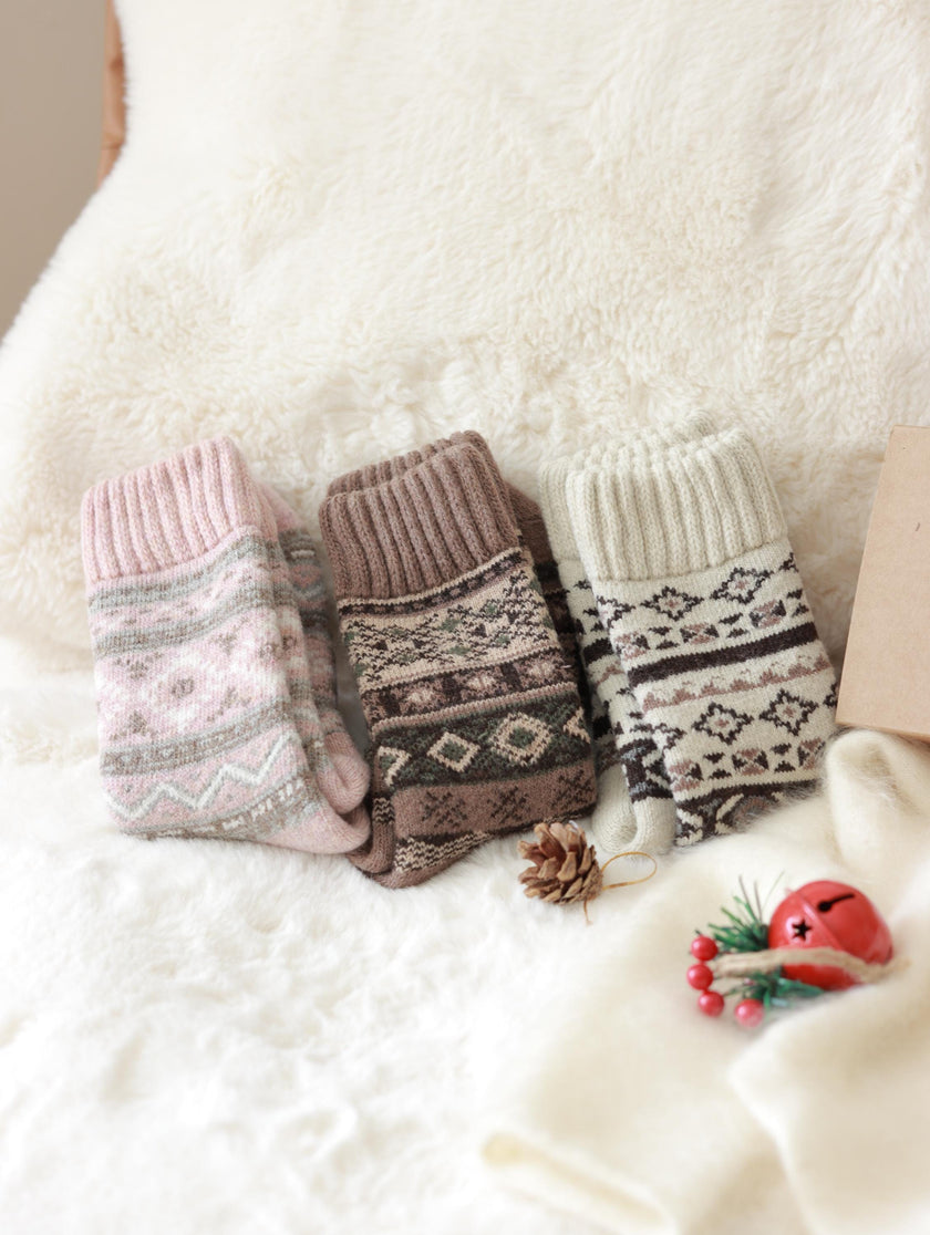 Three pairs of Scandinavian Merino wool socks from Lian Loungewear in a gift box set, showcasing cozy, soft woolen socks.