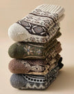 Three pairs of Scandinavian Merino wool socks from Lian Loungewear in a gift box set, showcasing cozy, high-quality wool socks.
