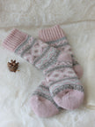 Three pairs of Scandinavian Merino wool socks in a gift box set by Lian Loungewear, showcasing cozy, warm sock designs.