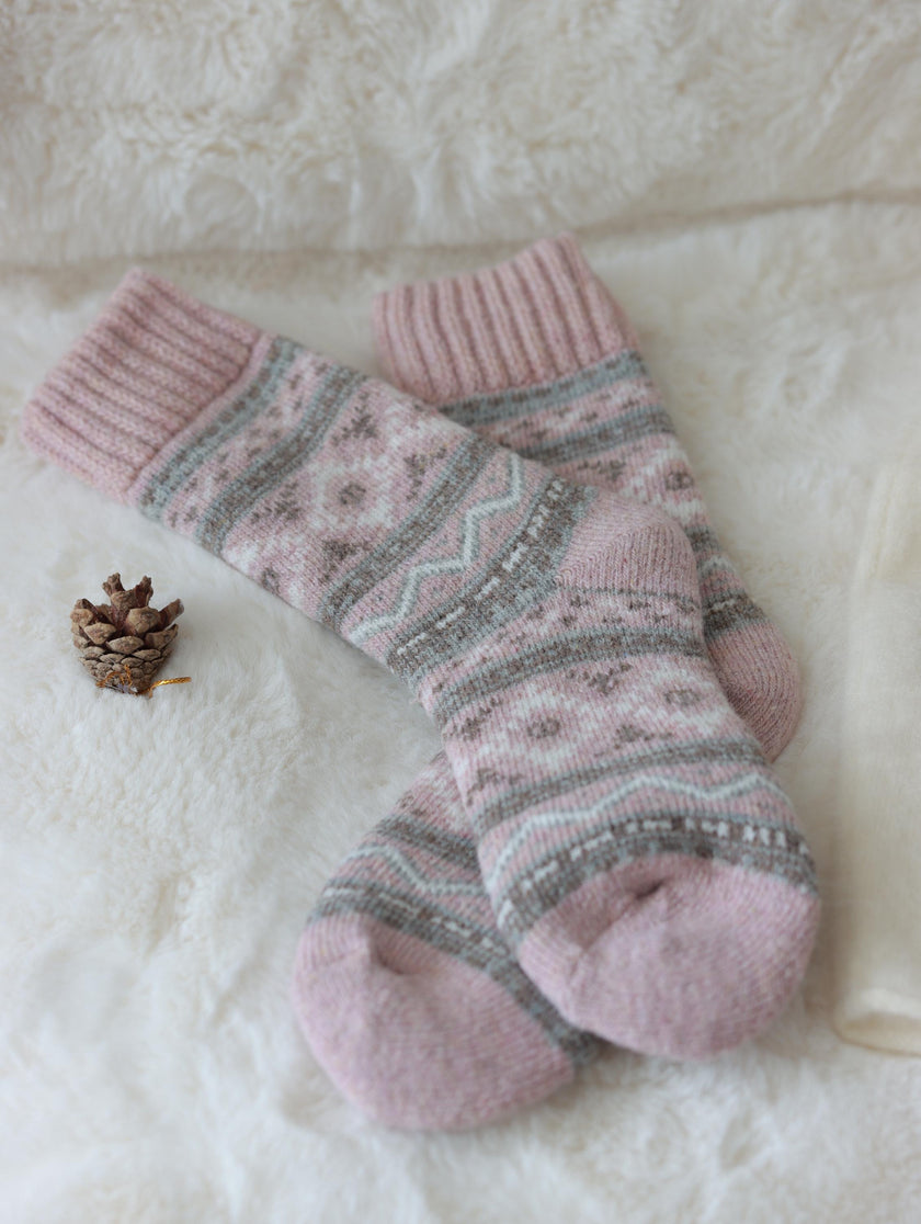 Three pairs of Scandinavian Merino wool socks in a gift box set by Lian Loungewear, showcasing cozy, warm sock designs.
