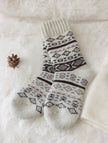 Three pairs of Scandinavian merino wool socks by Lian Loungewear in a gift box set, showcasing cozy, warm knit designs.