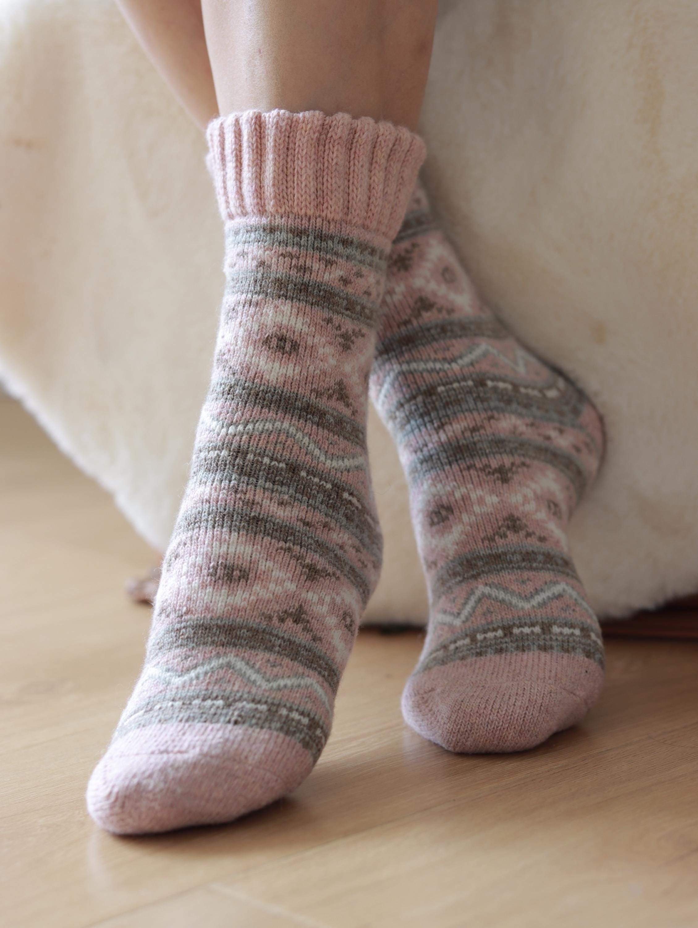 Three pairs of Scandinavian Merino wool socks from Lian Loungewear in a gift box set, showcasing cozy, warm sock designs.