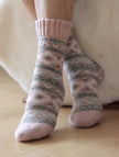 Three pairs of Scandinavian Merino wool socks from Lian Loungewear in a gift box set, showcasing cozy, warm sock designs.