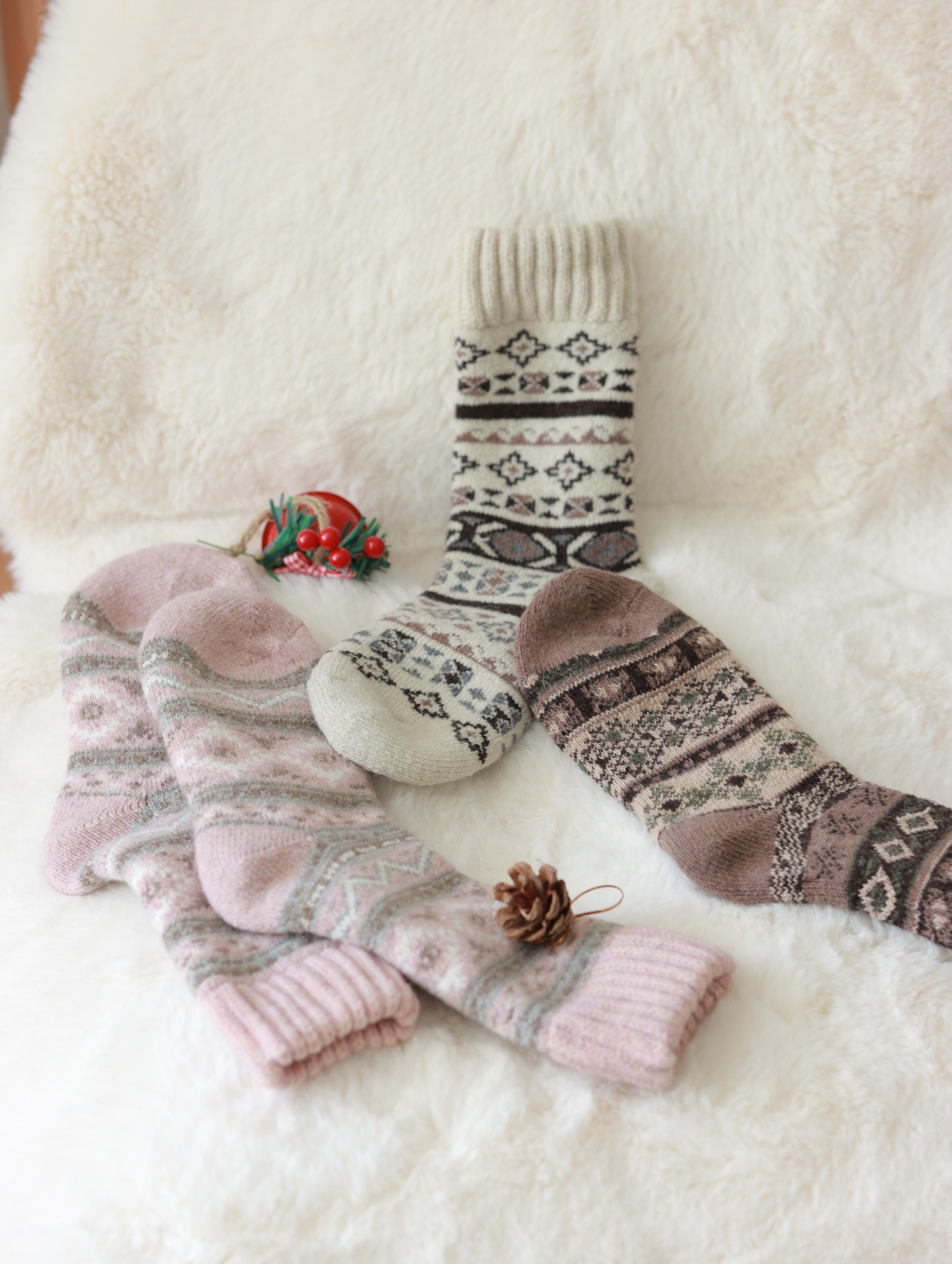 Three pairs of Scandinavian Merino wool socks in a gift box set by Lian Loungewear, showcasing cozy, soft wool socks for winter.