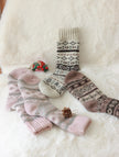 Three pairs of Scandinavian Merino wool socks in a gift box set by Lian Loungewear, showcasing cozy, soft wool socks for winter.
