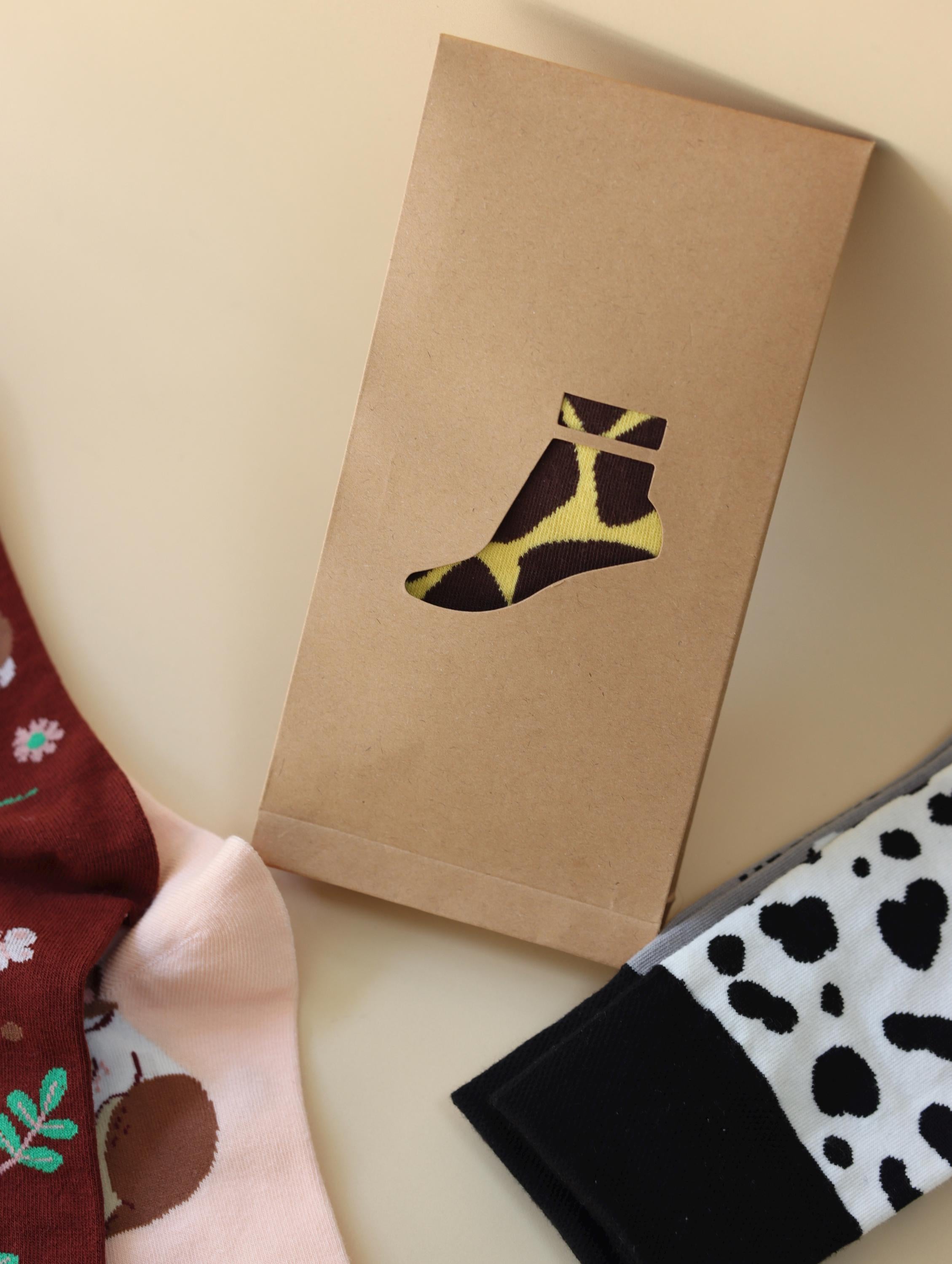 Lian Loungewear AB Novelty Crew Socks with animal and graphic designs, cotton blend, mismatched style, in gift box options.