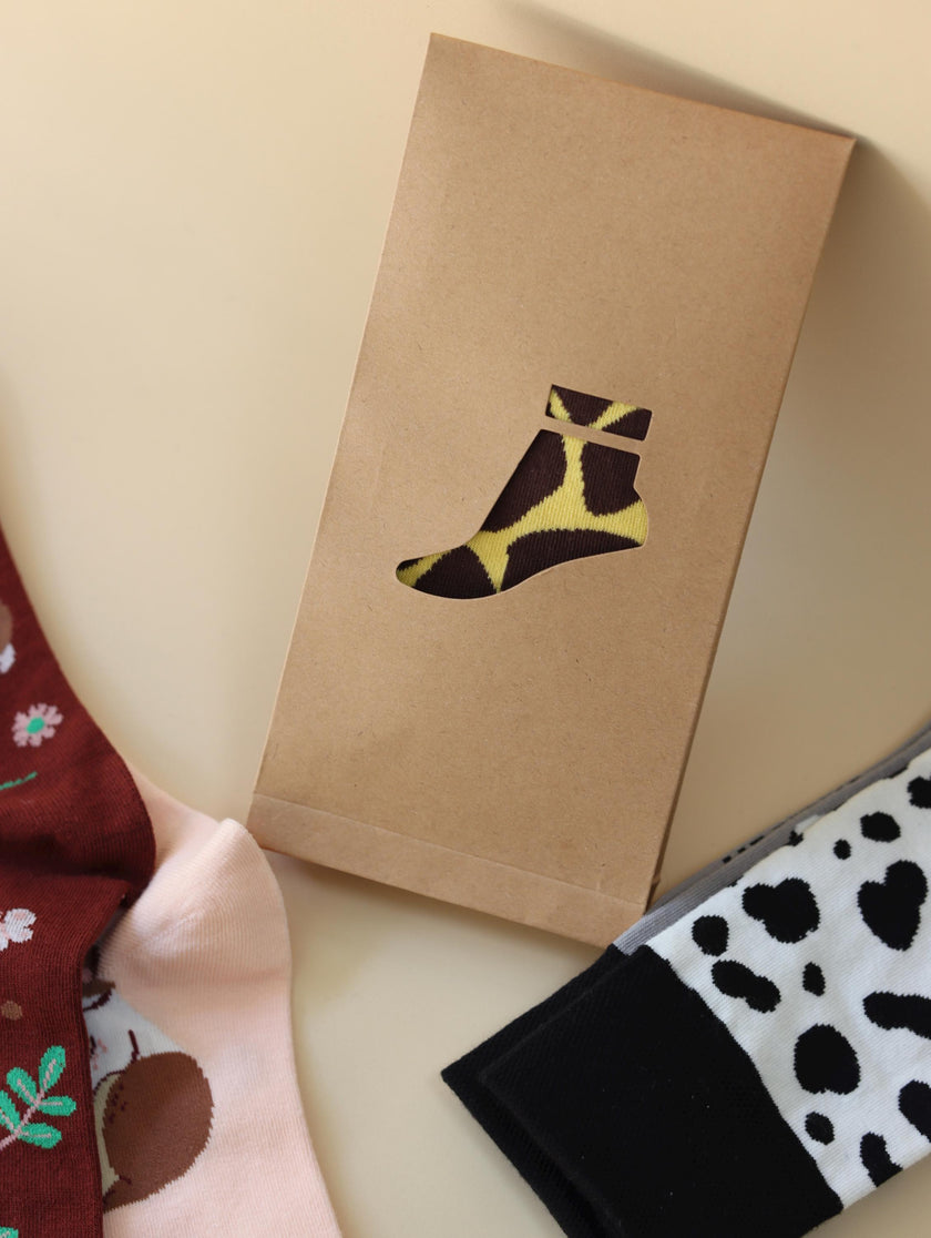 Lian Loungewear AB Novelty Crew Socks with animal and graphic designs, cotton blend, mismatched style, in gift box options.