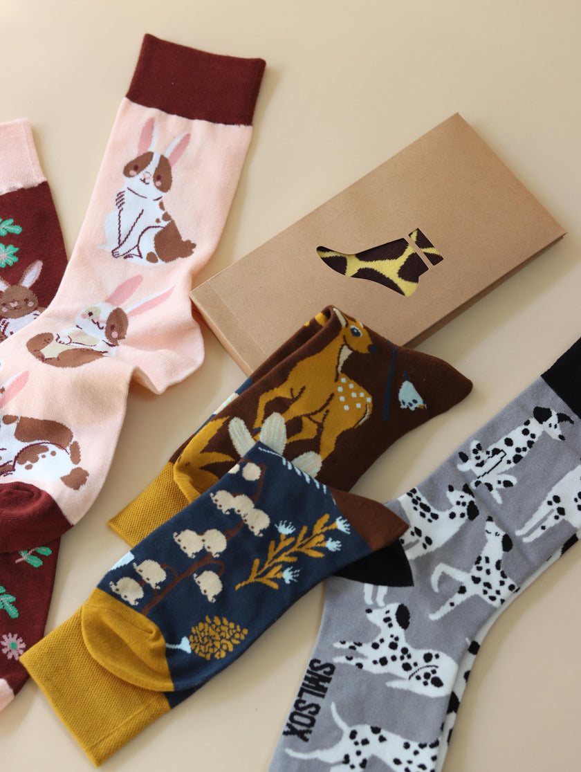 Lian Loungewear AB Novelty Crew Socks featuring animal and graphic mismatched designs in a cotton blend, one or four pairs gift box