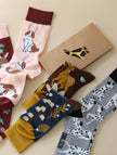 Cotton blend funny mismatched socks by Lian Loungewear featuring animal and graphic designs in a gift box set for birthdays.