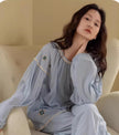 Sky blue gauze cotton pajama set by Lian Loungewear with embroidered or ruffle top, comfortable loungewear for relaxing nights.