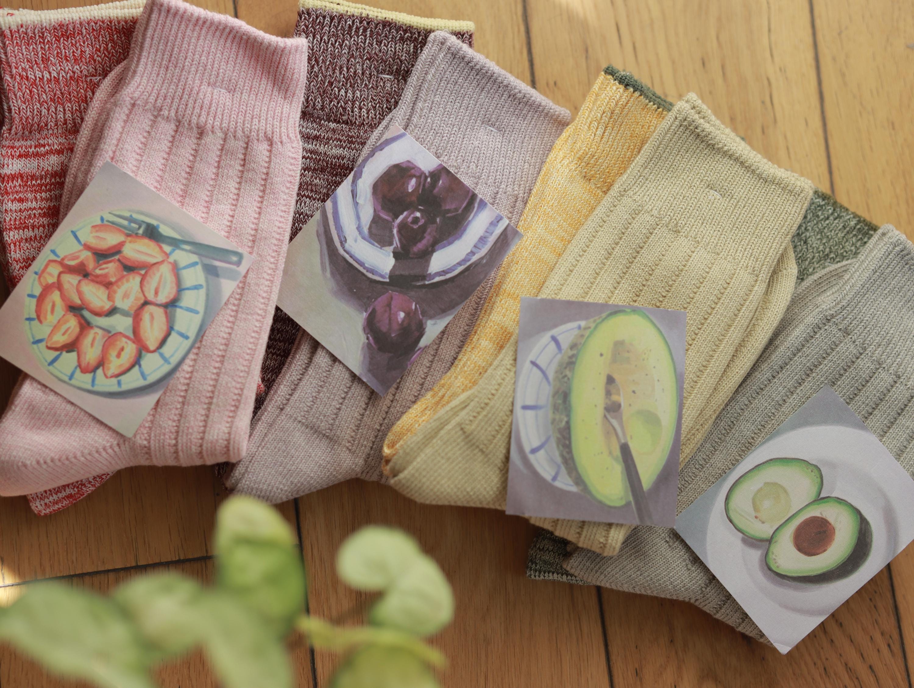 Set of two organic cotton crew socks featuring fruit plant-dyed designs from Lian Loungewear, UK size 3-7, with grape motif.