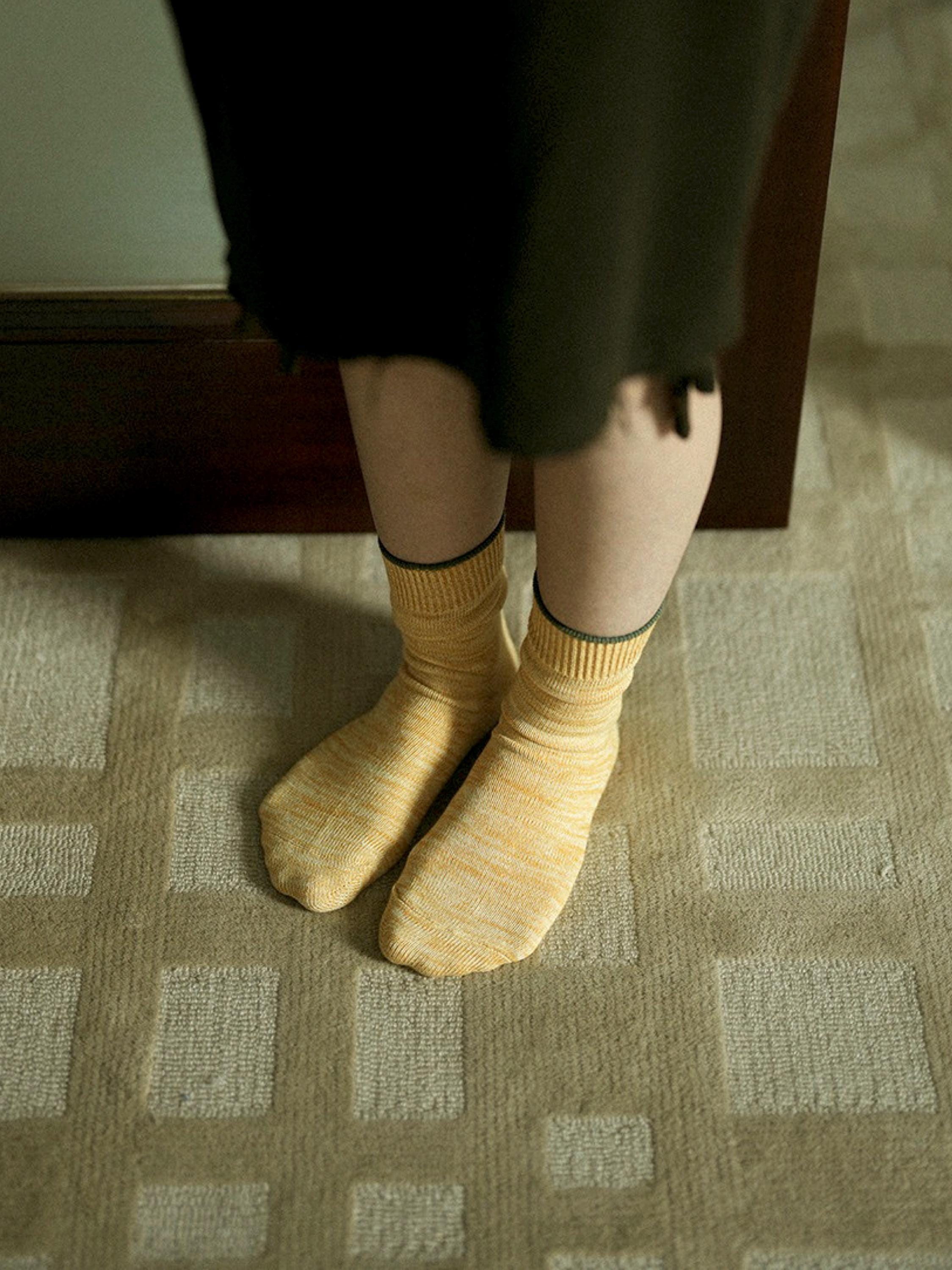 Pair of organic cotton crew socks from Lian Loungewear in fruit plant-dyed design, UK size 3-7, featuring grape pattern.