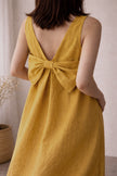 Green linen maxi dress with bow back detail by Lian Loungewear, showcasing a relaxed washed linen loungewear style.