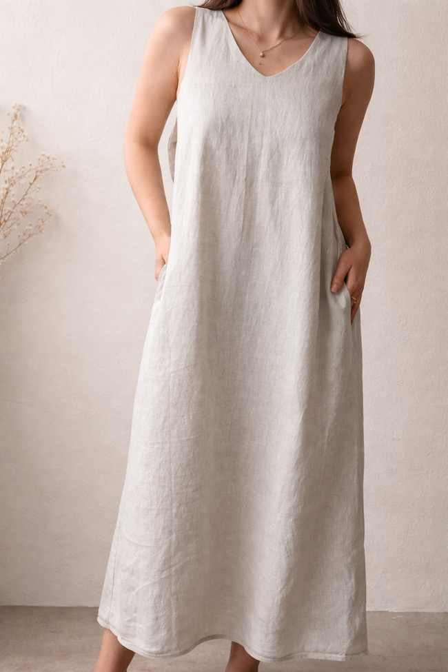 Green linen maxi dress by Lian Loungewear featuring a bow back and washed linen texture, perfect for casual loungewear.