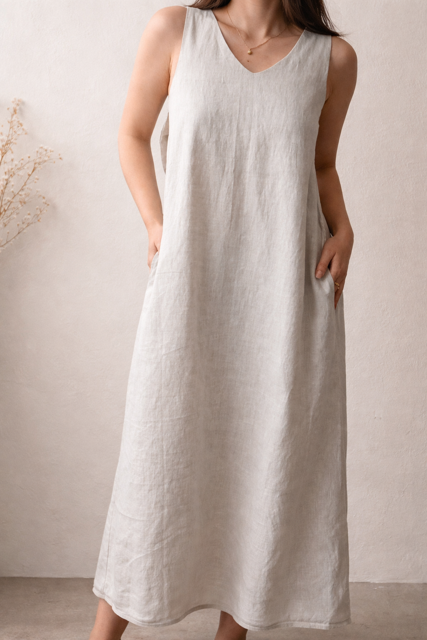 Green linen maxi dress by Lian Loungewear featuring a bow back and washed linen texture, perfect for casual loungewear.
