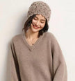 Ivory cream hand-knit cashmere-wool beanie with crochet lace pattern, warm winter cap by Lian Loungewear.