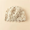 Ivory cream hand-knit cashmere-wool beanie with crochet lace detail, warm winter cap by Lian Loungewear.