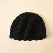 Ivory hand-knit cashmere-wool beanie with crochet lace, warm winter cap by Lian Loungewear, cozy and stylish for cold weather.
