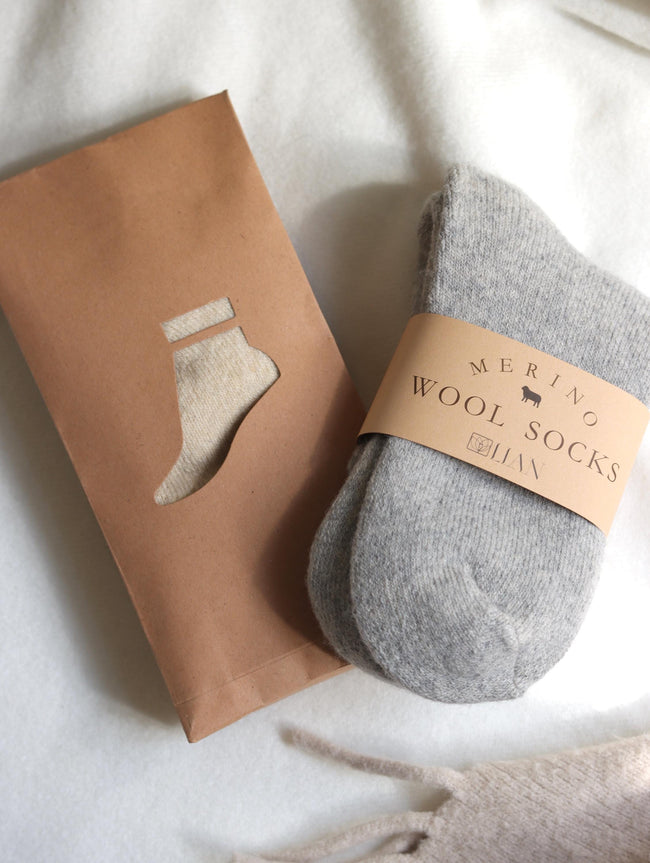 Light grey Merino wool slippers socks for women, ultra warm and casual, ideal for winter comfort and cozy indoor wear.