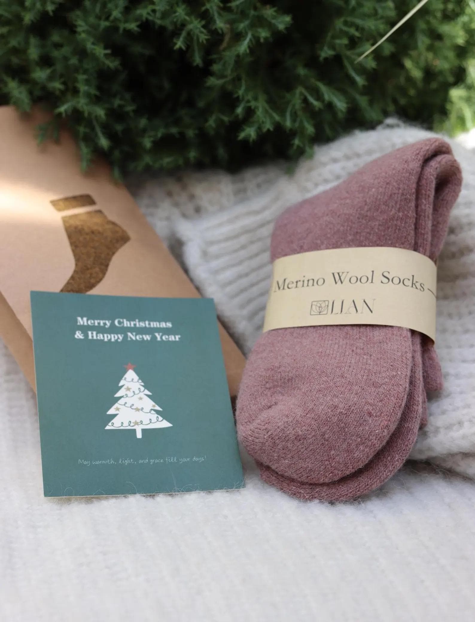 Light grey merino wool winter slipper socks for women, ultra warm and casual, designed for cozy comfort and everyday wear.