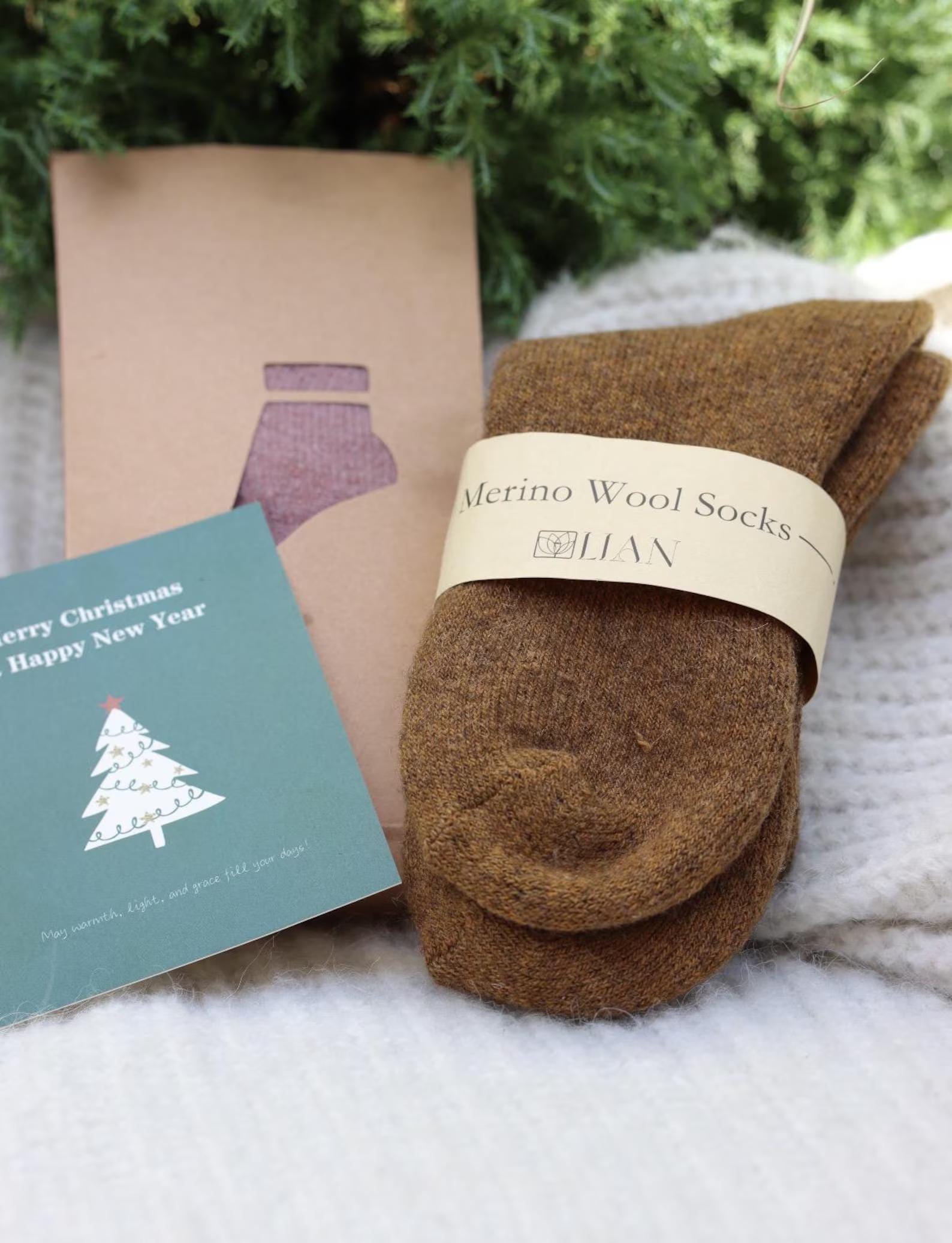 Light grey merino wool slipper socks for women, ultra warm and casual, ideal for cozy winter wear by Lian Loungewear.