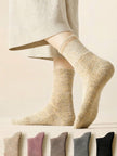 Light grey Merino wool slipper socks for women, ultra warm and casual, perfect for cozy winter wear by Lian Loungewear.