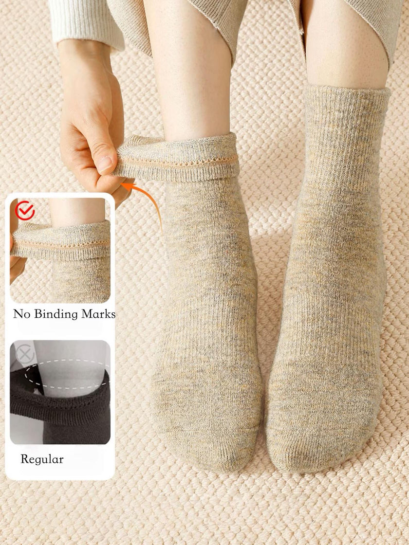 Light grey Merino wool slipper socks for women, ultra warm and casual, perfect for cozy winter wear by Lian Loungewear.