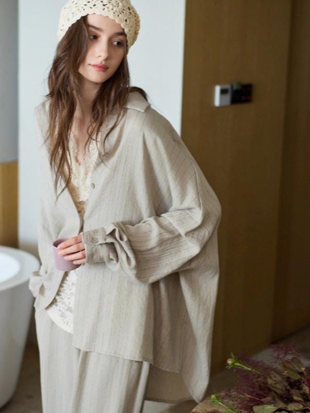 Beige cotton loungewear set for women with button-down pajamas, by Lian Loungewear, shown on a model.