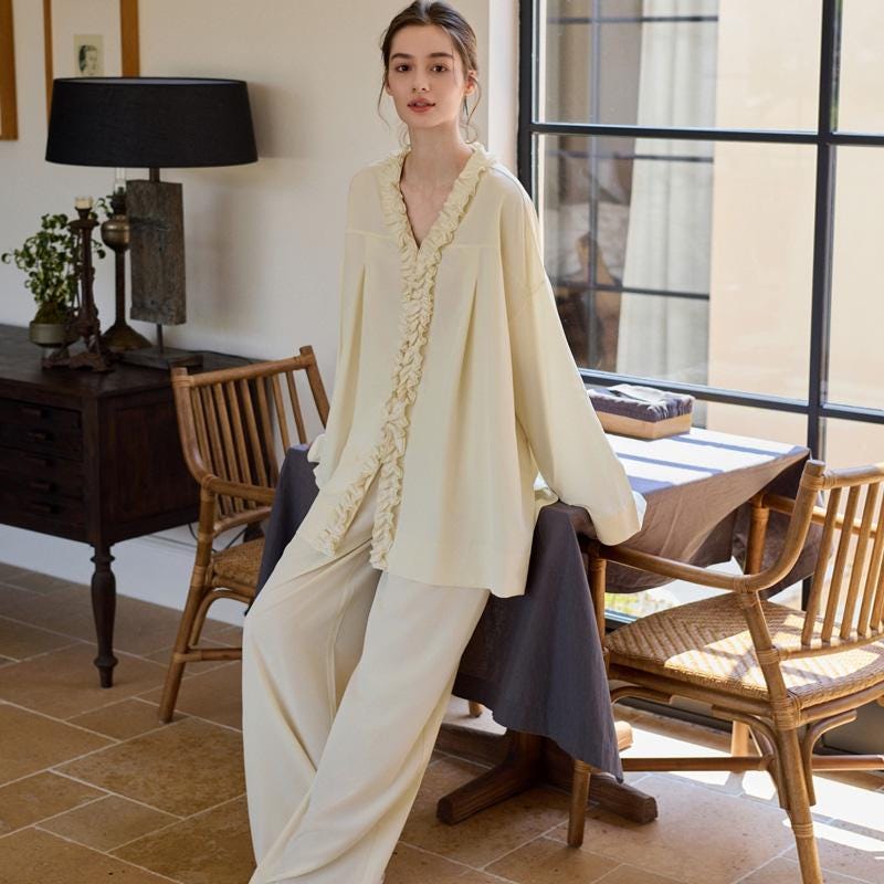 Creamy yellow cotton loungewear set by Lian Loungewear with relaxed fit and two collar styles, perfect for winter pajamas.