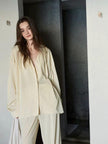 Creamy yellow cotton loungewear set by Lian Loungewear, relaxed fit pajamas with two collar styles for winter comfort.
