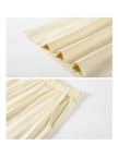 Creamy yellow cotton loungewear set by Lian Loungewear, relaxed fit pajamas with two collar styles for winter comfort.