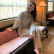 Lian Loungewear floral bamboo cotton loungewear set with vintage lace trim, featuring comfortable pajama top and bottoms.