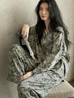 Women's floral cotton pajama set with lace trim by Lian Loungewear, cozy loungewear for relaxing at home.