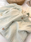 Mint green gauze cotton pajama set by Lian Loungewear featuring a breathable wide-leg design and relaxed fit.