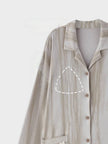 Lian Loungewear cotton robe dress with frayed cuffs, minimalist loungewear style, soft fabric, cozy and relaxed fit.