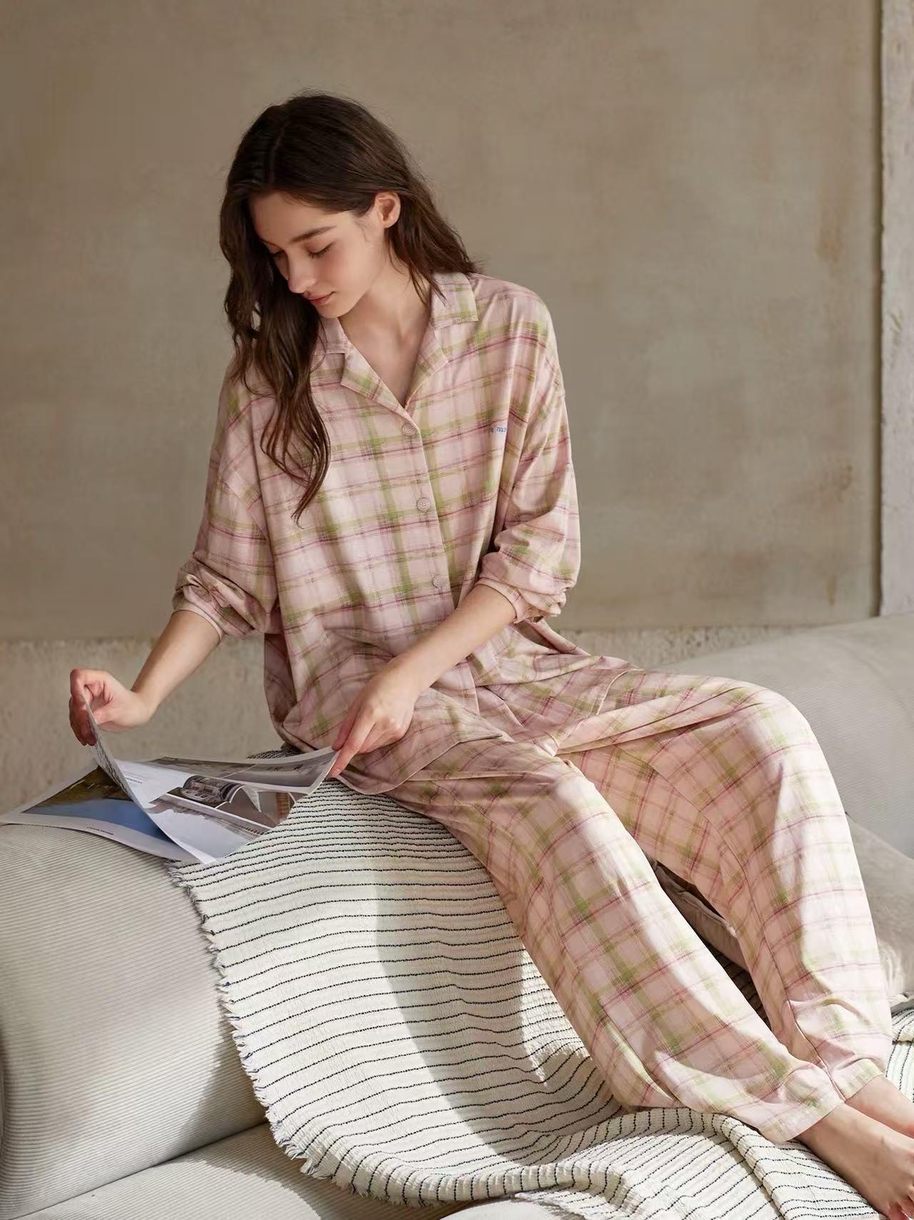Women's pink plaid cotton pajama set from Lian Loungewear, featuring soft, comfortable loungewear with long sleeves and matching pants.