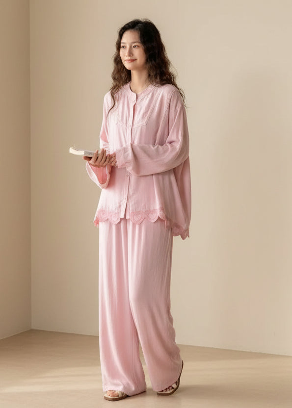 Pink bamboo cotton sleepwear set with embroidered heart details from Lian Loungewear, featuring a relaxed top and matching pants.
