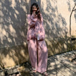 Pink embroidered heart bamboo cotton sleepwear set by Lian Loungewear, featuring a comfortable, stylish pajama top and bottoms.