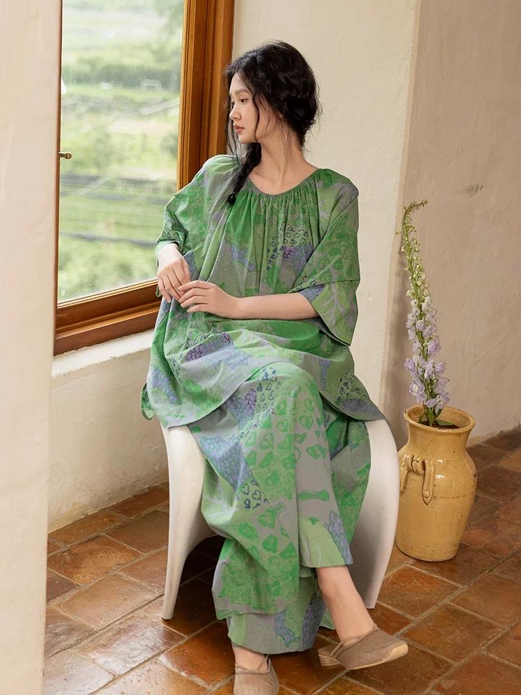 Green bamboo cotton loungewear set by Lian Loungewear with botanical print and oversized fit, featuring relaxed pants and top.
