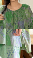Green bamboo cotton loungewear set with botanical print, oversized fit, by Lian Loungewear, featuring relaxed pants and matching top.