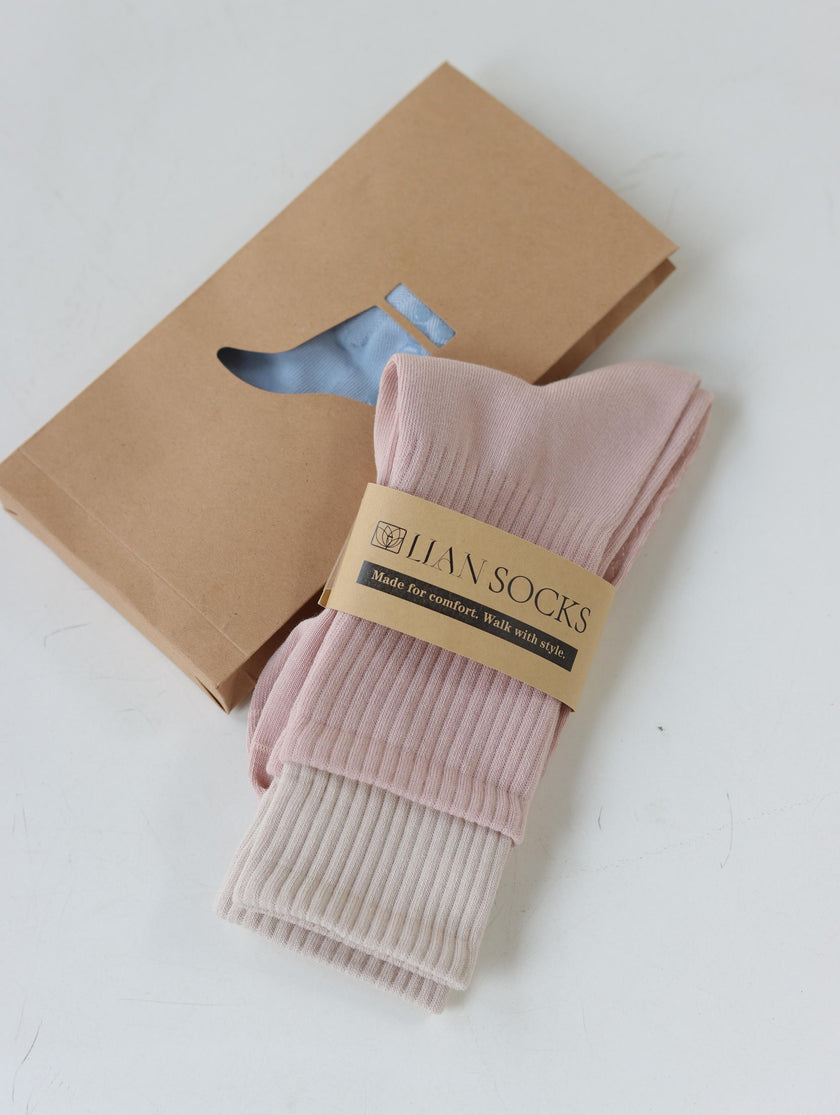 Pink Lian Loungewear Pilates grip socks for women, cotton yoga socks with non-slip soles, relaxed fit for barre and workout sessions.