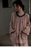 Pink gauze cotton pajama set for women by Lian Loungewear, featuring a relaxed fit and comfortable fabric for lounging.
