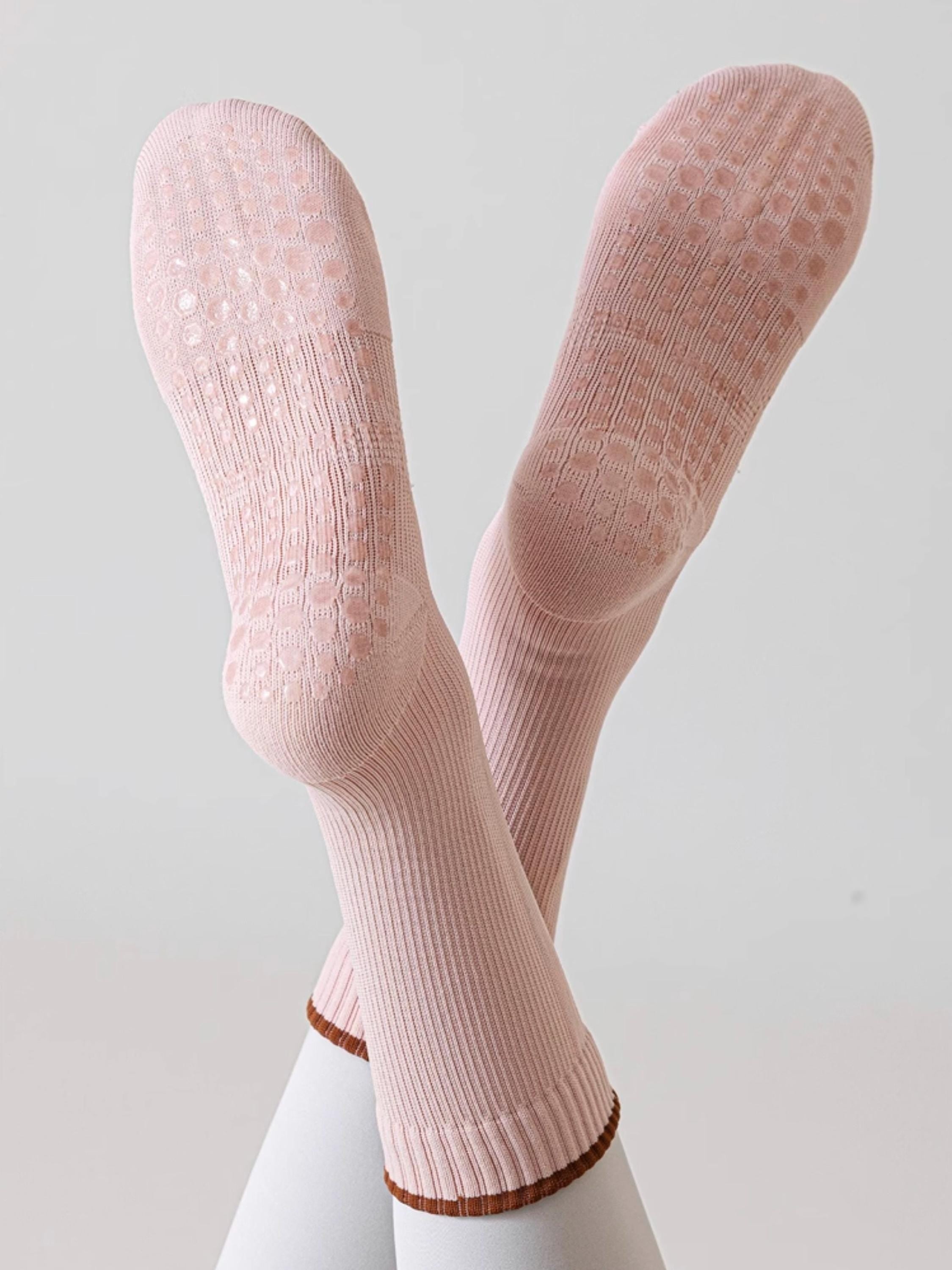 Pink Lian Loungewear Pilates compression socks for women with non-slip grip, arch support, and tight fit for stability during yoga and barre.
